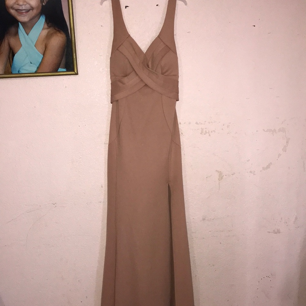 Dress, long body-con dress slit on the left side.
